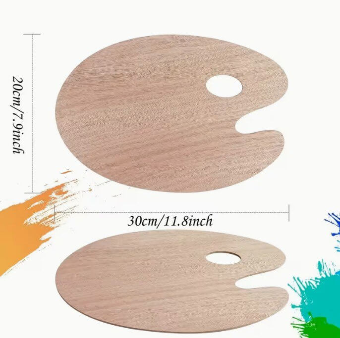 Wooden artist palette with oval shape and thumb hole, top view